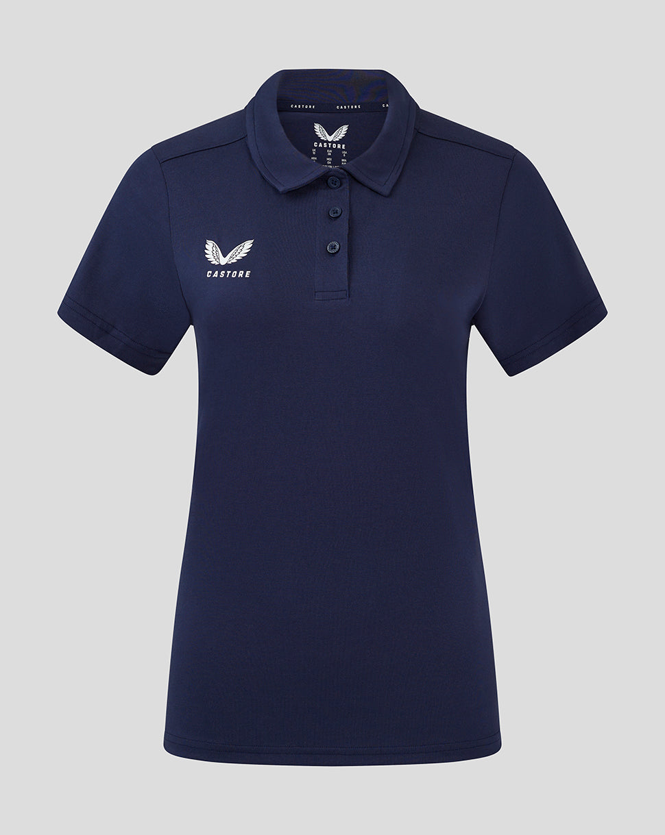 Front view of navy women's cotton leisure polo with Castore logo on left chest