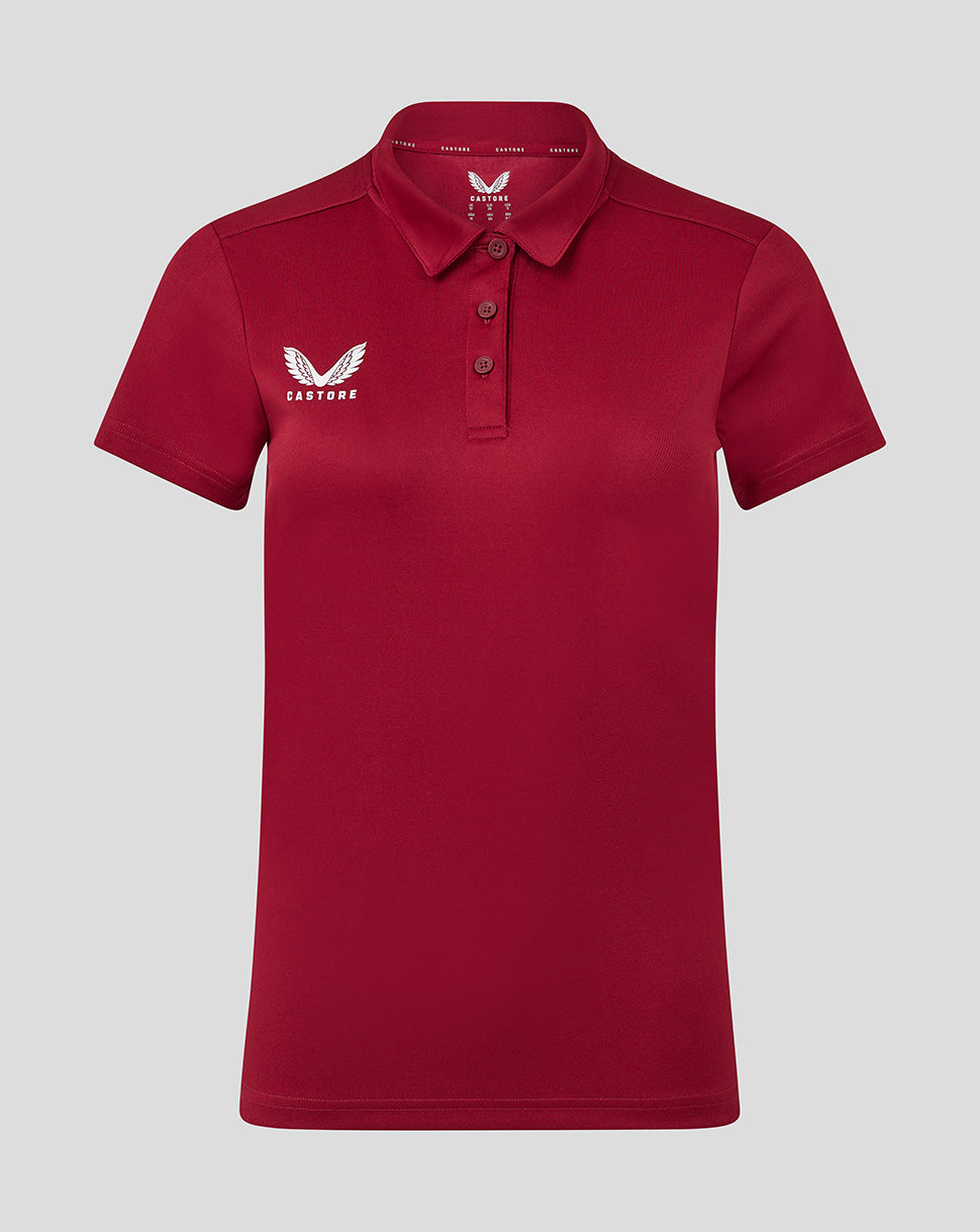 Front view of red Womens Performance Polo with self fabric collar three button placket and Castore logo