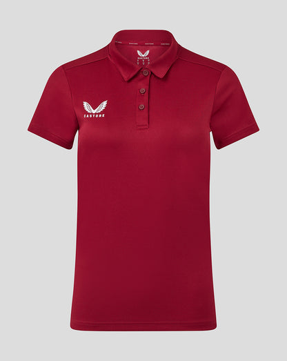Front view of red Womens Performance Polo with self fabric collar three button placket and Castore logo