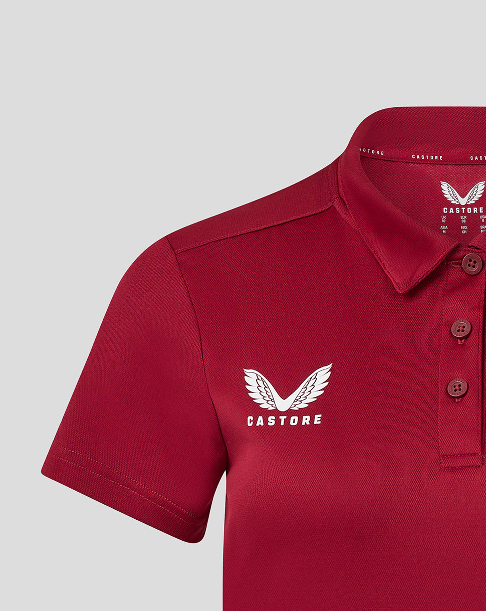 Womens performance polo in biking red with three button placket and Castore logo on chest
