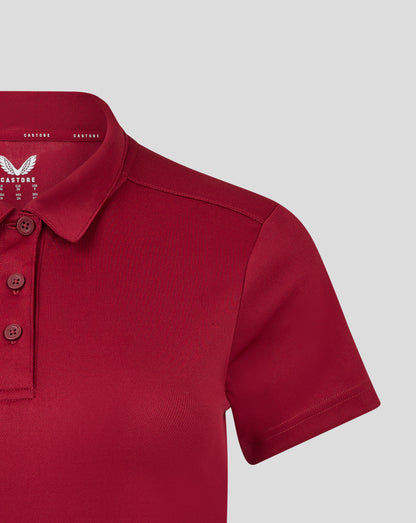 Close up of collar area featuring the Castore branding inside the red polo