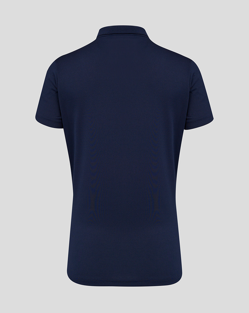 Back view of the navy women's performance polo showing a classic polo silhouette and short sleeves