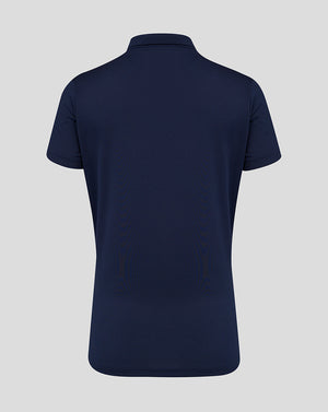 Back view of the navy women's performance polo showing a classic polo silhouette and short sleeves