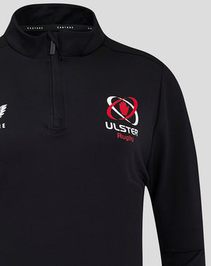 Close up of black quarter zip top showing Castore wing logo on left chest and Ulster Rugby crest on the right.