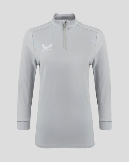 Front view of light gray Castore Womens 1/4 Zip High Rise top with funnel neck and chest logo