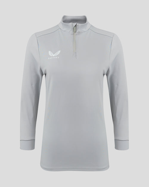 Front view of light gray Castore Womens 1/4 Zip High Rise top with funnel neck and chest logo
