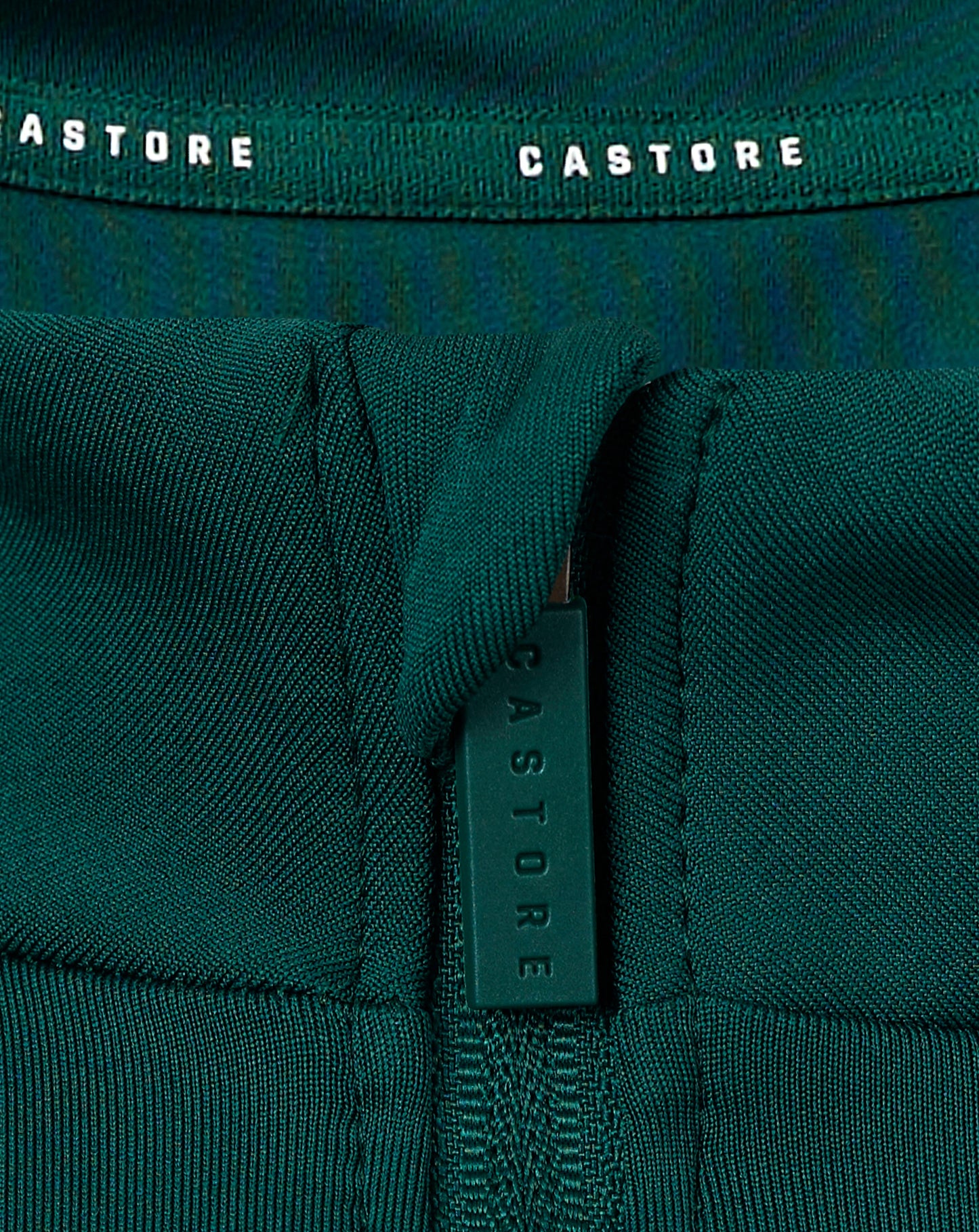 Back of teal Botanical Garden women's 1/4 zip top focusing on collar seam