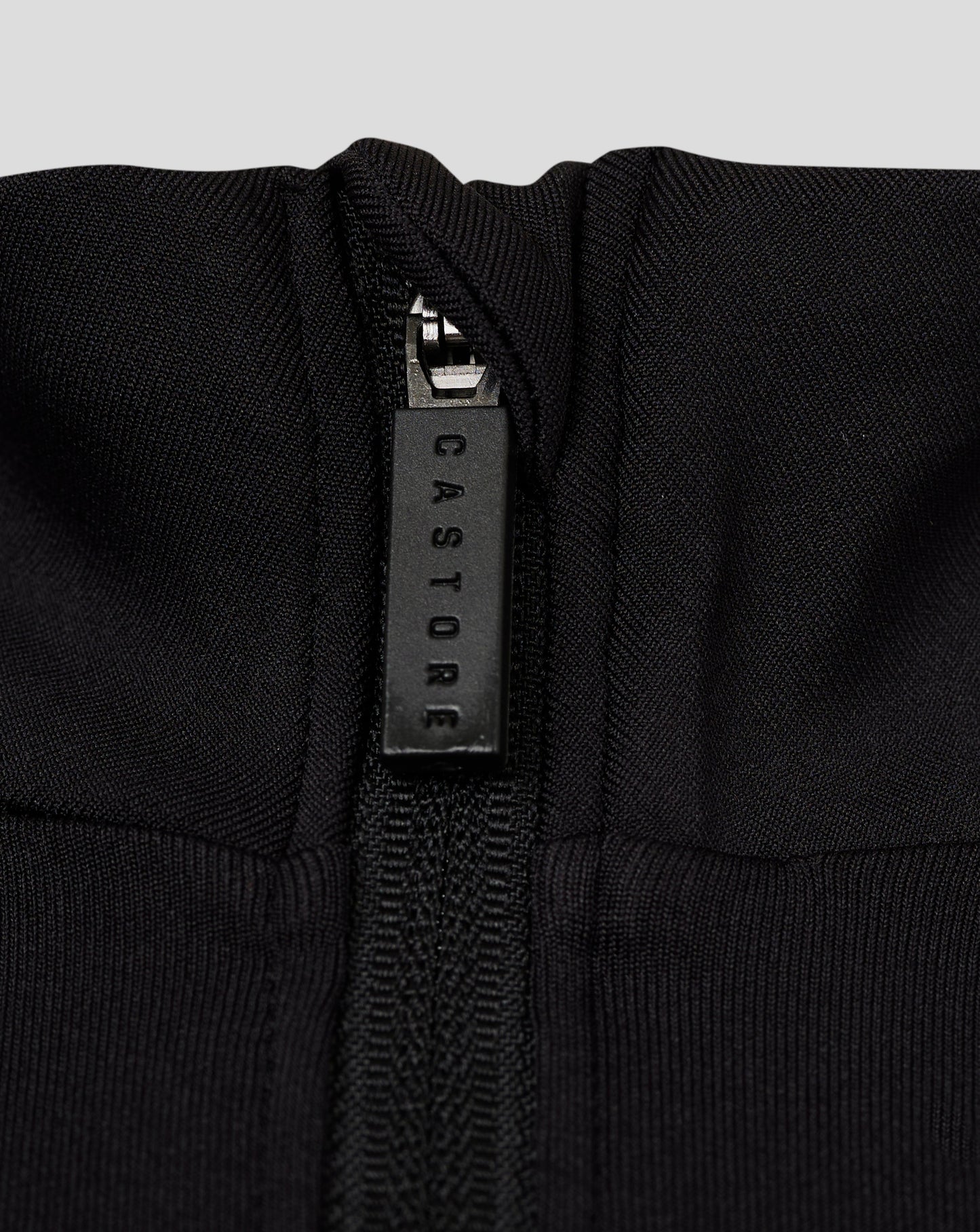 Back view of black long sleeve 1/4 Zip highlighting forward shoulder seam