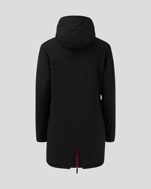Back view of black long staff jacket with hood and burgundy zipper trim.