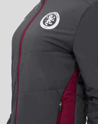 Close up of chest area with the Aston Villa crest and burgundy zipper on the front.