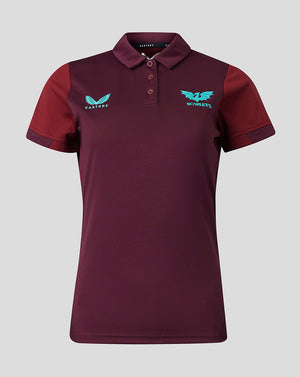 Front view of burgundy Scarlets travel polo with turquoise crest on left chest and Castore logo on right chest.