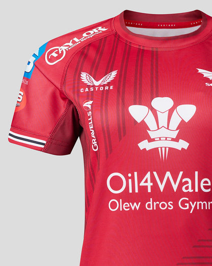 Back view of Scarlets Women’s 23/24 home shirt with ASCONA and Dyfed Steels logos on a red striped jersey