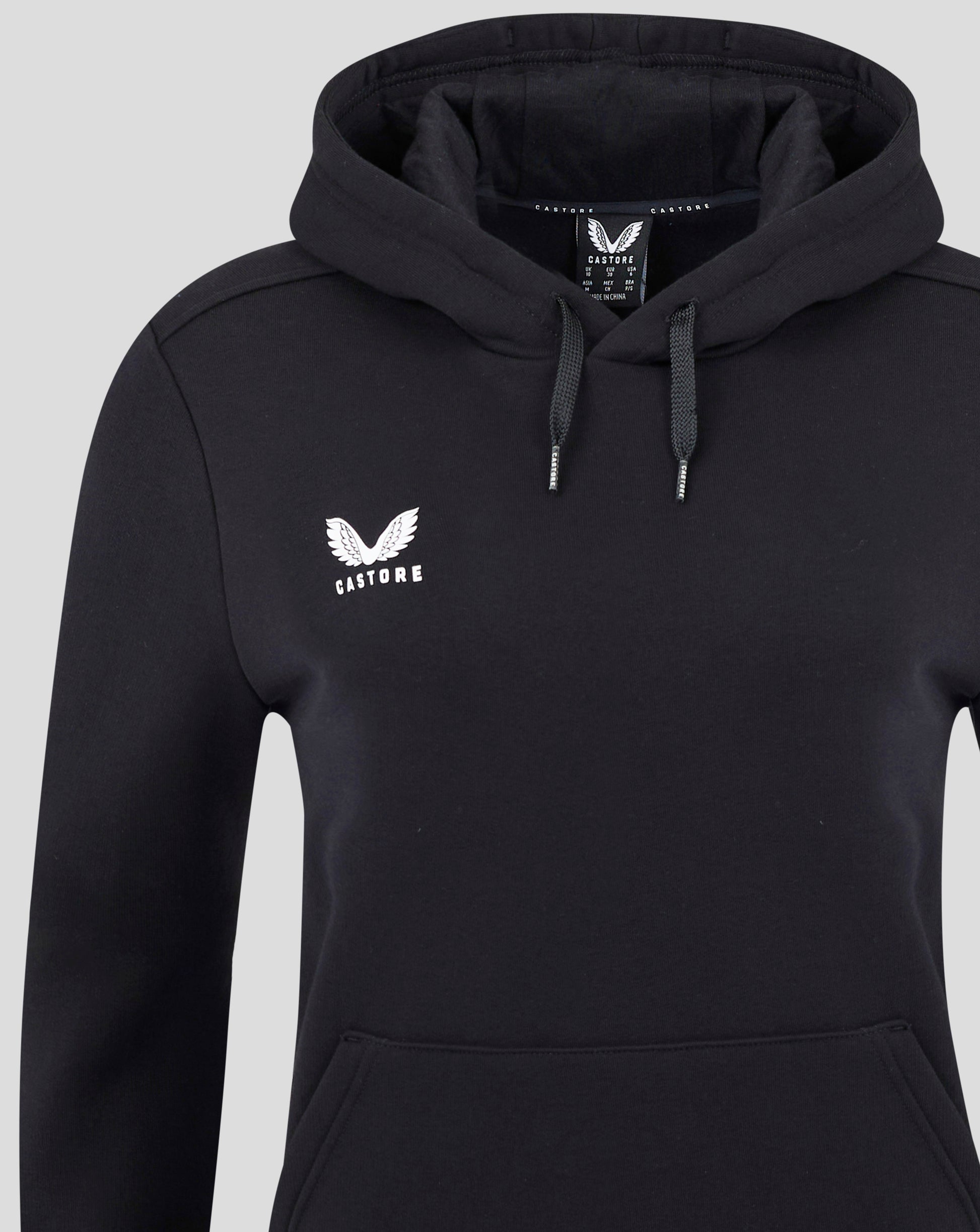 Close up of black Castore hoodie showing hood with drawstrings and white Castore logo on chest