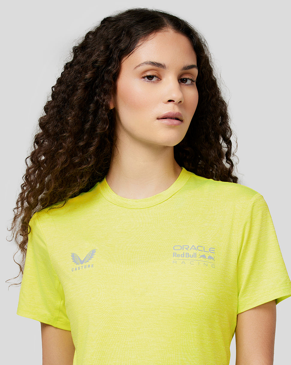 Close-up of reflective Oracle Red Bull Racing logos on the neon yellow women's tee