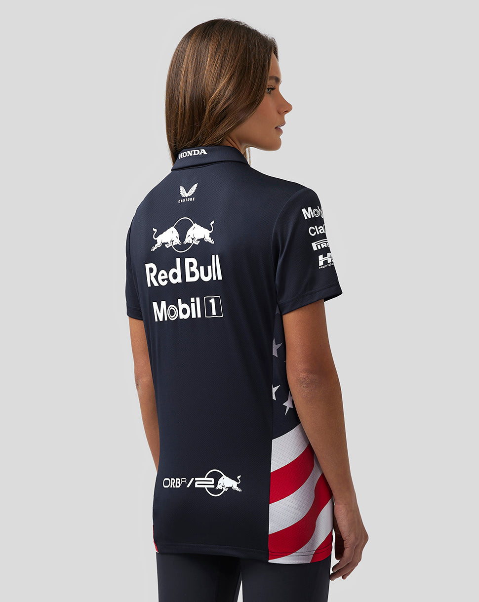 Back view of navy polo showing large Red Bull and Mobil 1 logos with star-spangled side panels.
