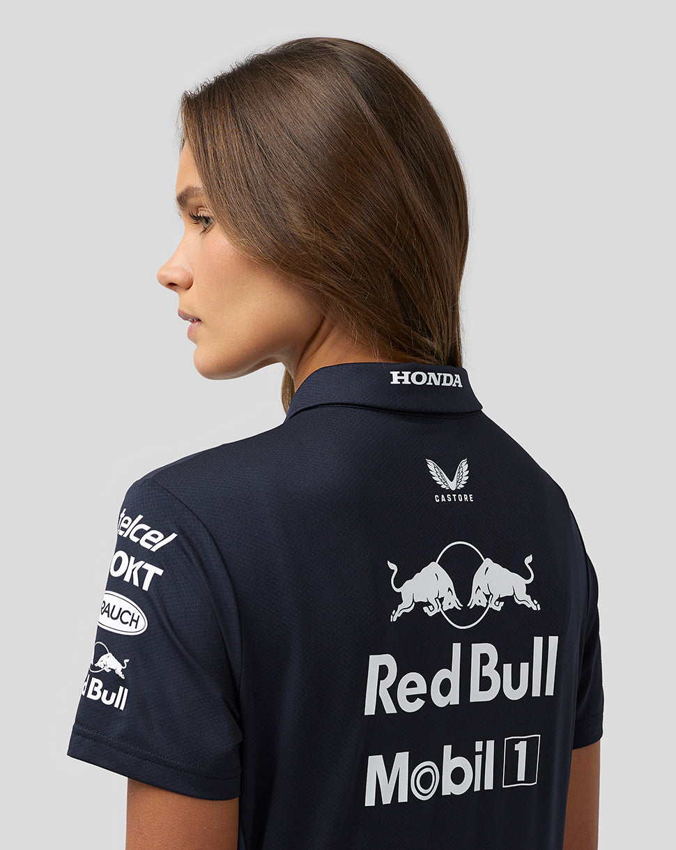 Rear three-quarter view of navy polo with Honda on the collar and Red Bull Mobil 1 logos on back and striped side panels.