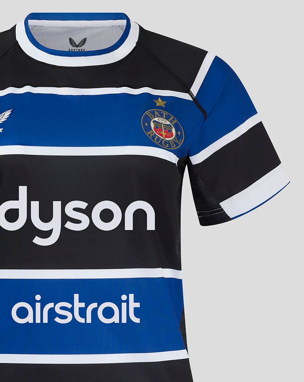 Close up of Bath Rugby jersey chest showing the club crest on the left and Dyson logo across the front.