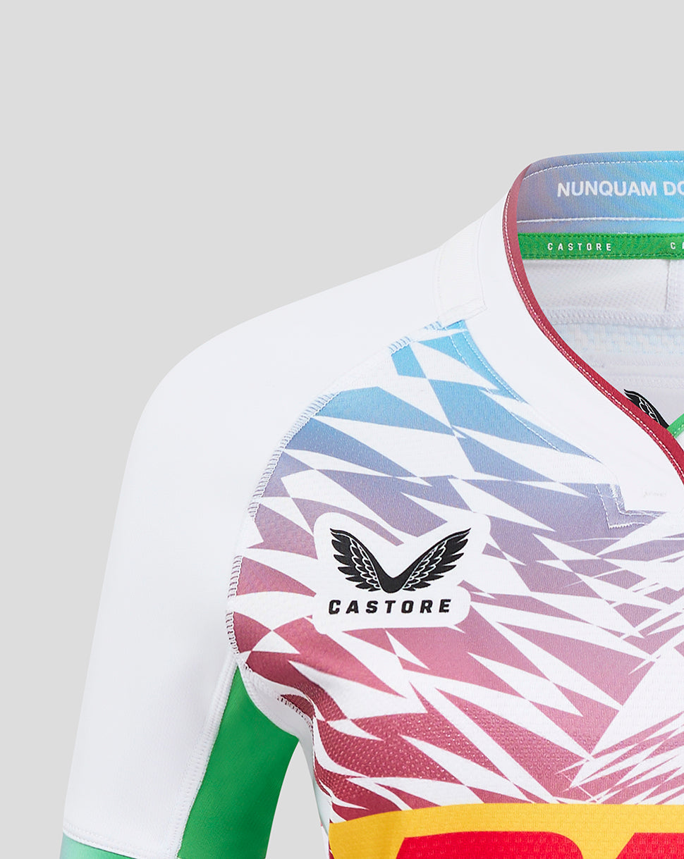 Shoulder and chest view of Harlequins Away Pro Shirt with vibrant geometric print and Castore logo.