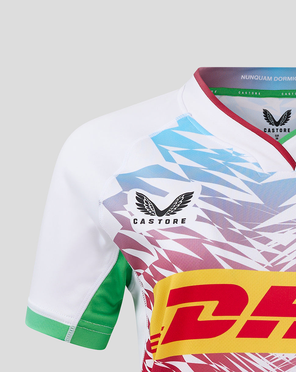 Harlequins Women Away Shirt close-up with multicoloured geometric print, left chest crest and right chest Castore branding.