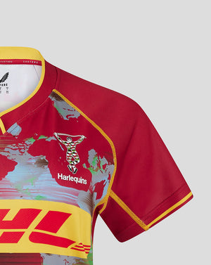 Front close-up of Harlequins Women 24/25 Big Game Shirt showing Harlequins crest and DHL banner over the world map print