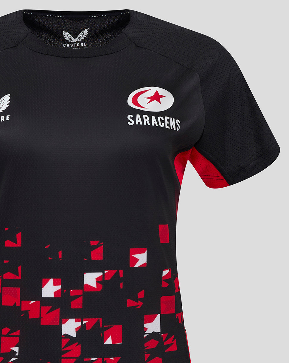 Close up of Saracens women's 24/25 matchday tee in black with red side panels and a red white mosaic pattern at the hem