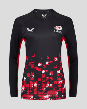 Front view of black Saracens women's long sleeve tee with red side panels and a red white geometric pattern at the hem; Castore and Saracens logos on the chest