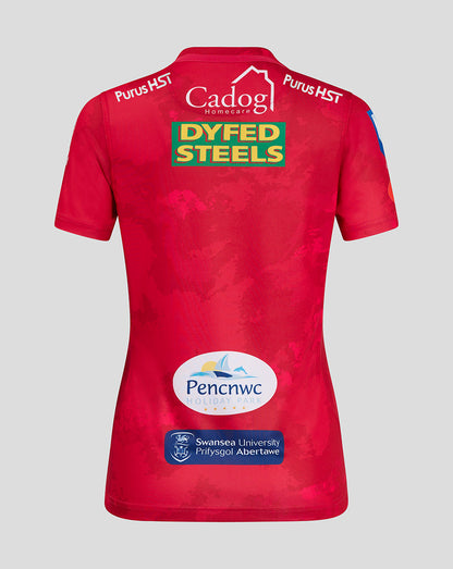 Back view of red Scarlets women's home shirt with a large Dyfed Steels sponsor across the upper back and additional sponsor logos.