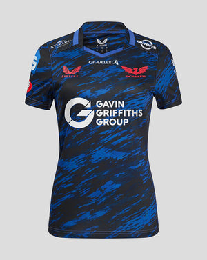 Front view of Scarlets Women's Away Shirt in blue camouflage with Gavin Griffiths Group across the chest, Scarlets crest left chest, and Castore branding right.