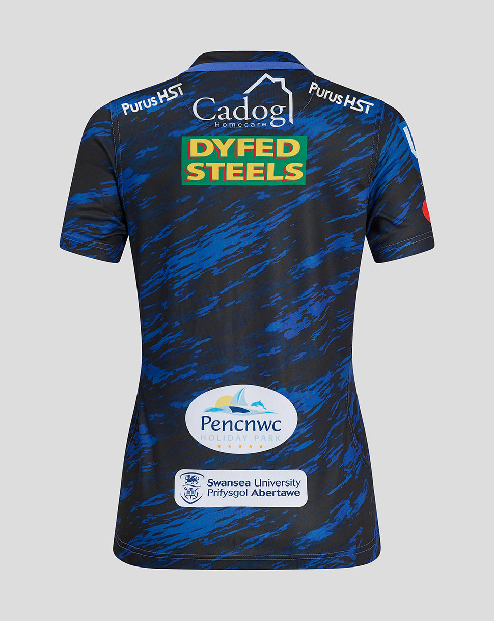 Back view of Scarlets Women's Away Shirt in dark blue camo with Dyfed Steels logo centered on the back and additional sponsor logos along the lower back.