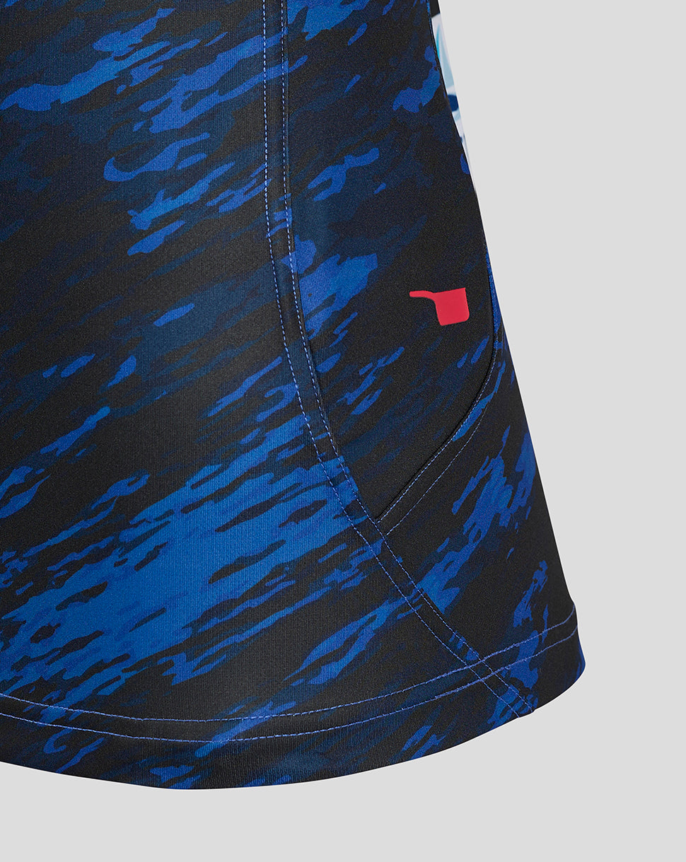 Close up of the Scarlets Away Shirt sleeve showing blue camouflage fabric with a small red sponsor mark.