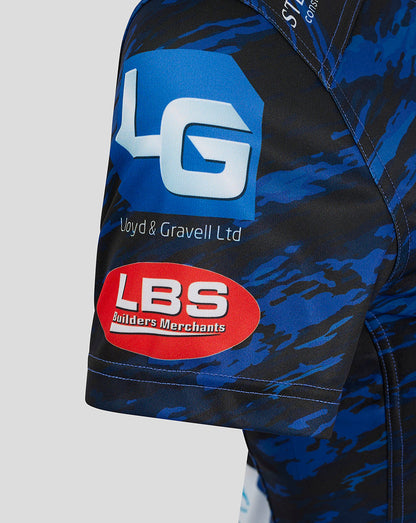 Close-up of Scarlets away shirt sleeve in blue camo, displaying Lloyd & Gravell Ltd and LBS sponsor logos.