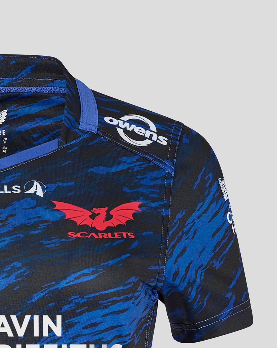Shoulder detail of Scarlets Away Shirt showing blue camouflage print and Owens branding on the sleeve.