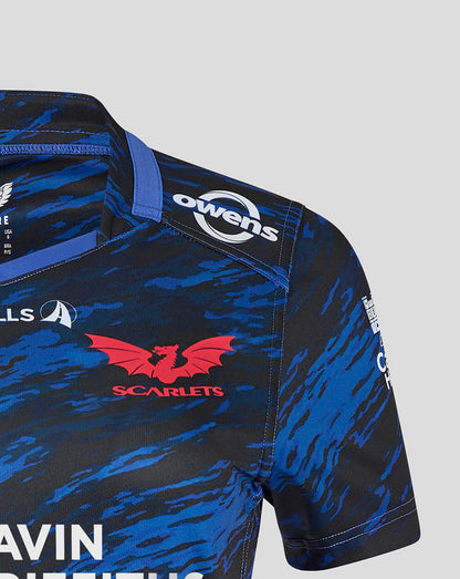 Shoulder detail of Scarlets Away Shirt showing blue camouflage print and Owens branding on the sleeve.