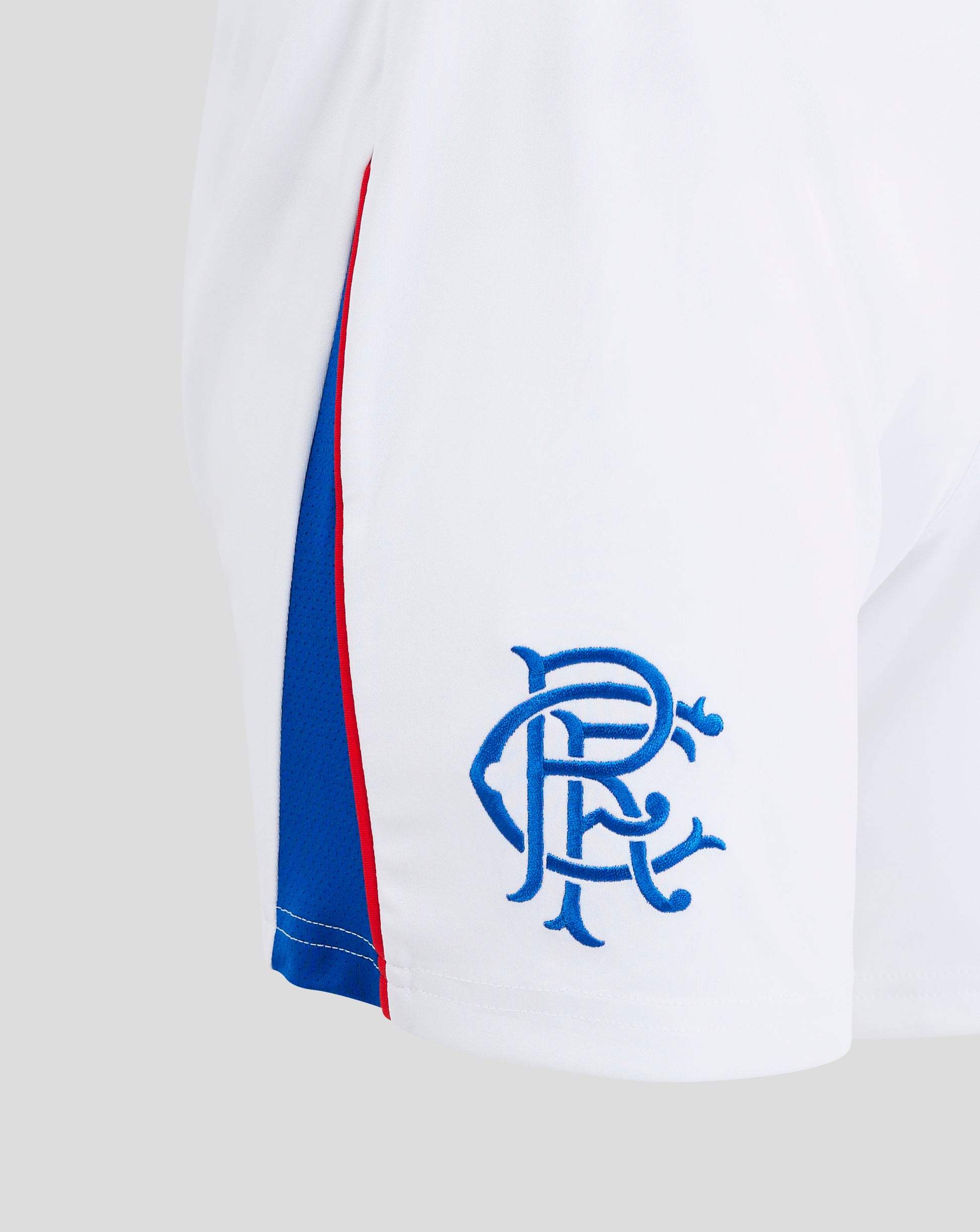 White Rangers Women's 24/25 Home Shorts side view shows red piping and blue panel along seam.