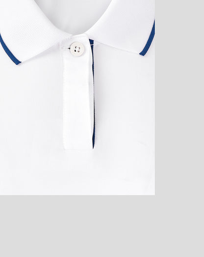 Close up of white polo collar with tipping and concealed placket