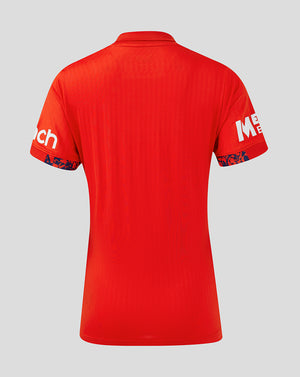 Back view of fiery red England Women's 24/25 T20 shirt with minimal branding visible on the sleeves