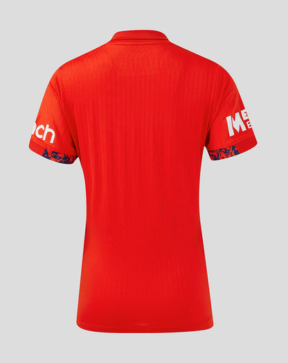 Back view of fiery red England Women's 24/25 T20 shirt with minimal branding visible on the sleeves