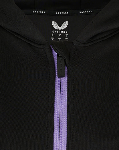Inside neck label with Castore branding and size chart for the England Women training hoodie