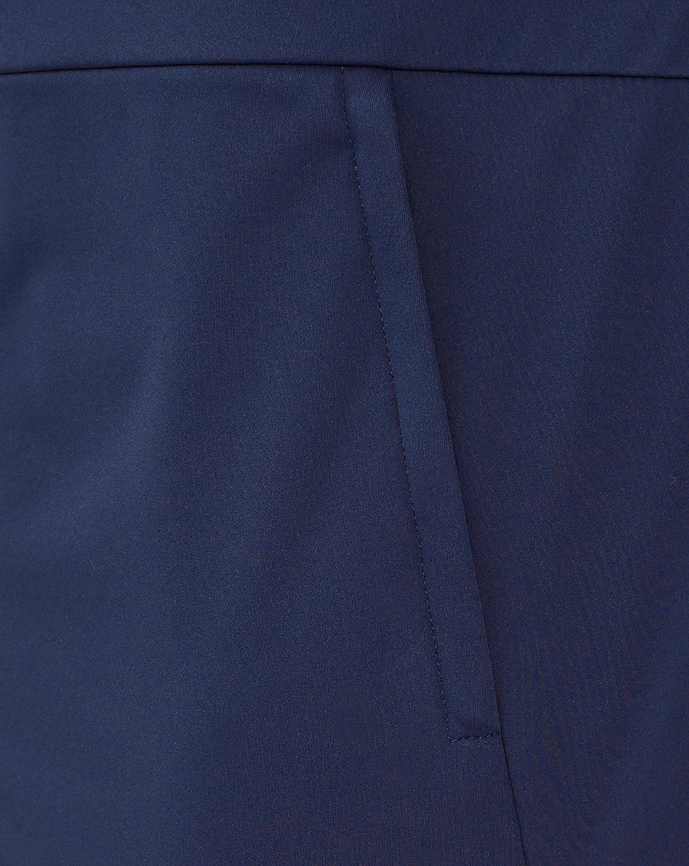 Close up of navy Rangers travel jacket side showing angled concealed zip pocket seam