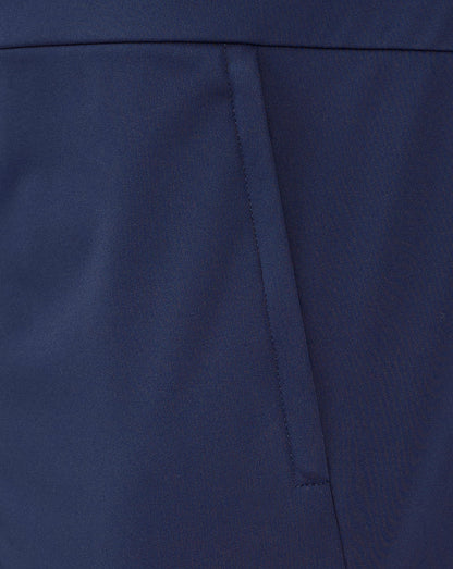 Close up of navy Rangers travel jacket side showing angled concealed zip pocket seam