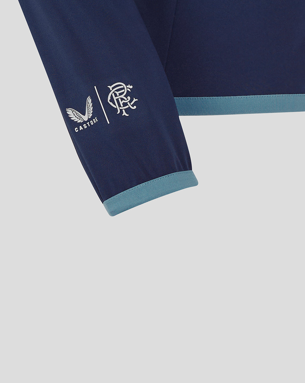 Close-up of Rangers FC travel jacket sleeve with Castore logo and club crest