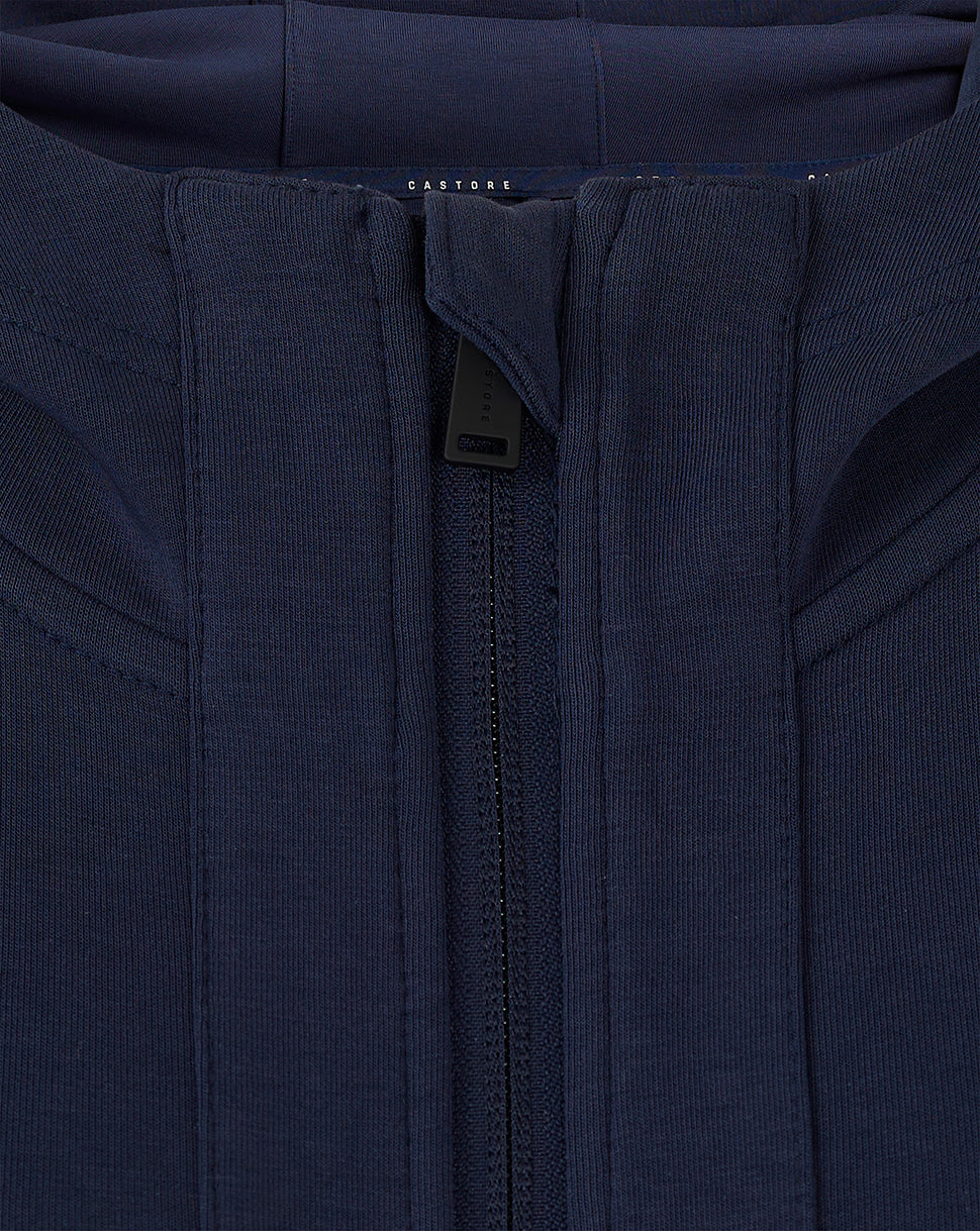 Close-up of zipper area at back neck on navy Rangers travel jacket with Castore branding
