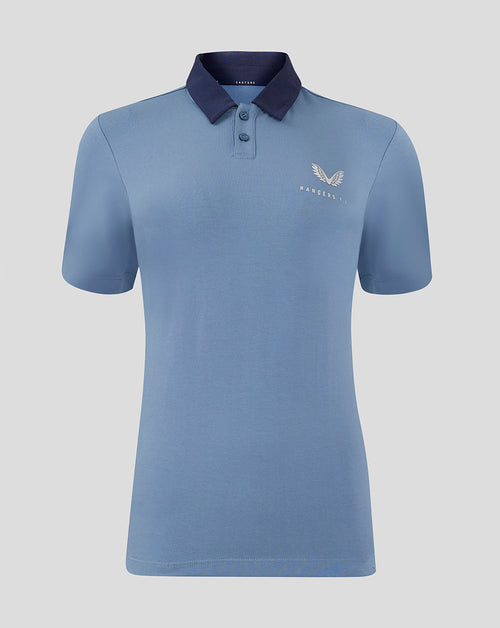 Front view of light blue Rangers Women Travel Polo with dark collar and crest on left chest