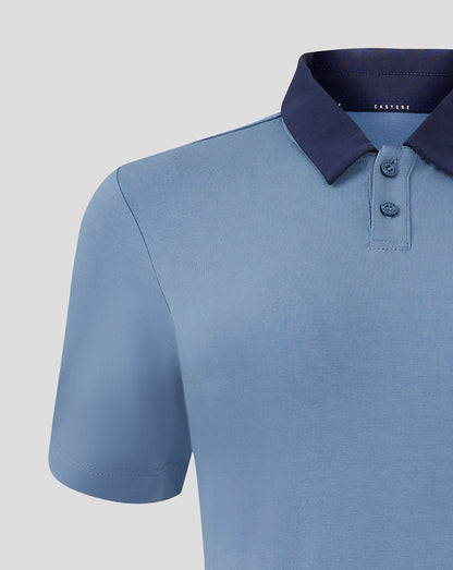 Close-up of navy collar and two-button placket on light blue Rangers polo with Castore branding inside