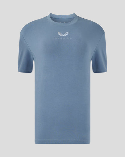 Light blue Rangers FC travel short sleeve T shirt front view with centered white club crest on the chest