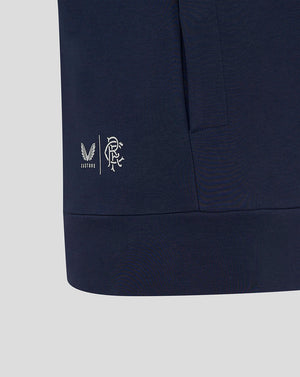 Close-up of navy Rangers travel hoody hem showing Castore and club branding near the side seam