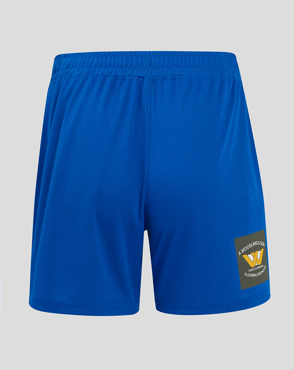 Blue Mansfield home shorts shown from back with flat waistband internal elastic side seam split crest on one thigh and Castore branding on the other