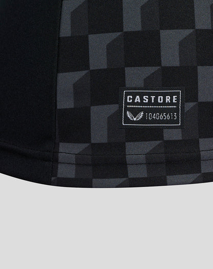 Close-up of Mansfield Third Shirt front showing geometric pattern with left chest crest and Castore on the right chest.