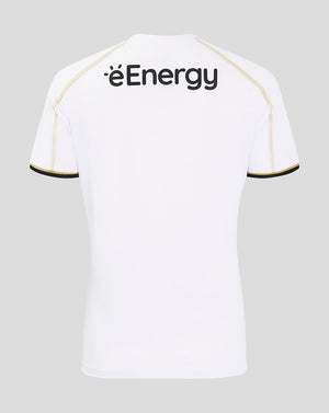 Back view of white MK Dons women's home shirt with éEnergy logo on the upper back and gold piping along the shoulders