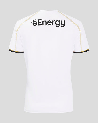 Back view of white MK Dons women's home shirt with éEnergy logo on the upper back and gold piping along the shoulders
